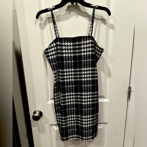 Houndstooth bodycon mini dress. Never been worn!